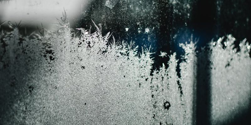 Wide shot of a window with light streaming in, suggesting morning.